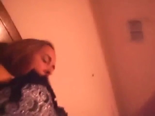 Cute MILF smiles as she gets licked by her pet